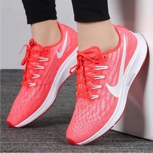Nike Coral Sneakers with Breathable Mesh Upper and White Sole